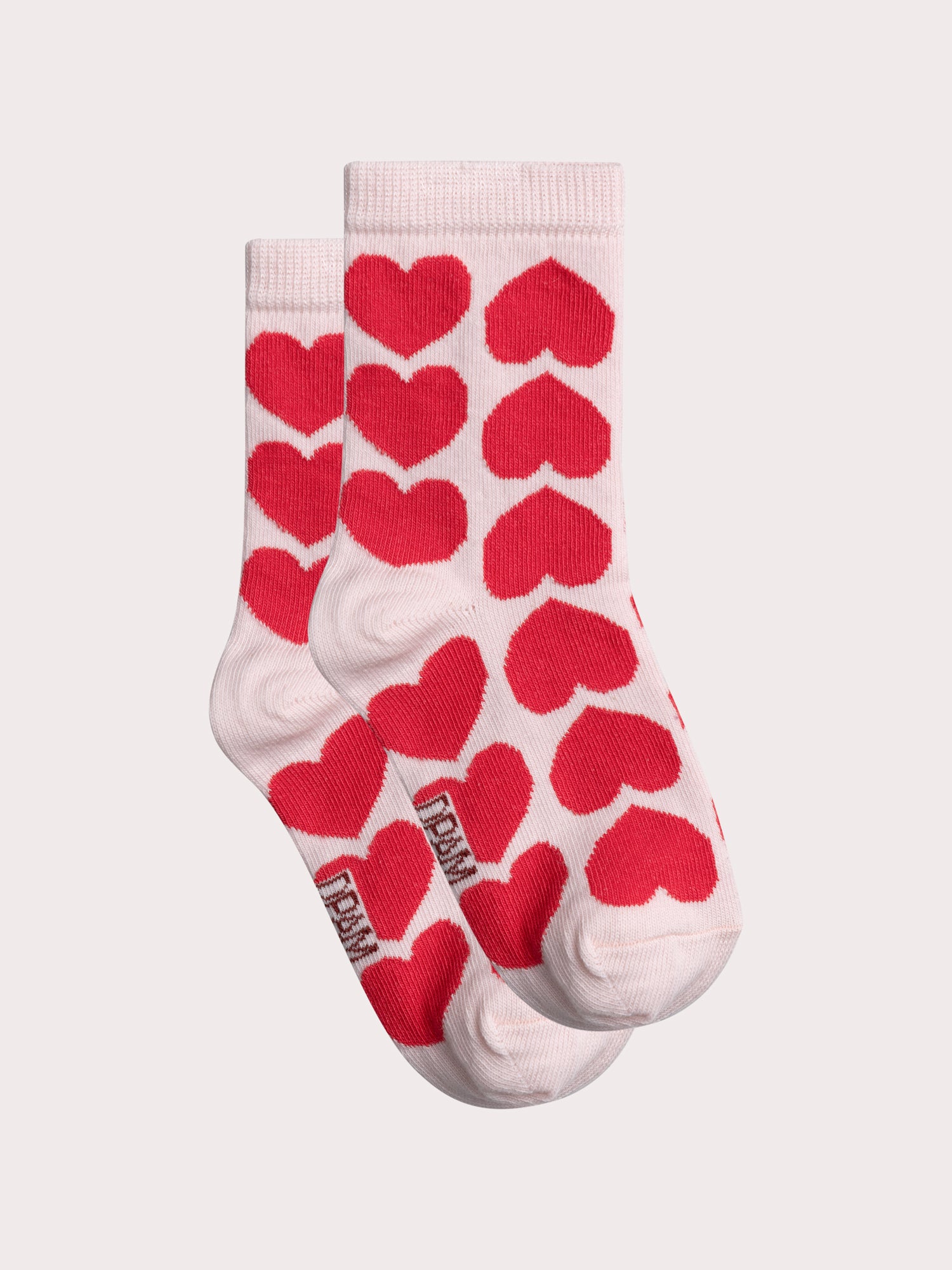 Chaussettes roses à cœurs rouges pour fille