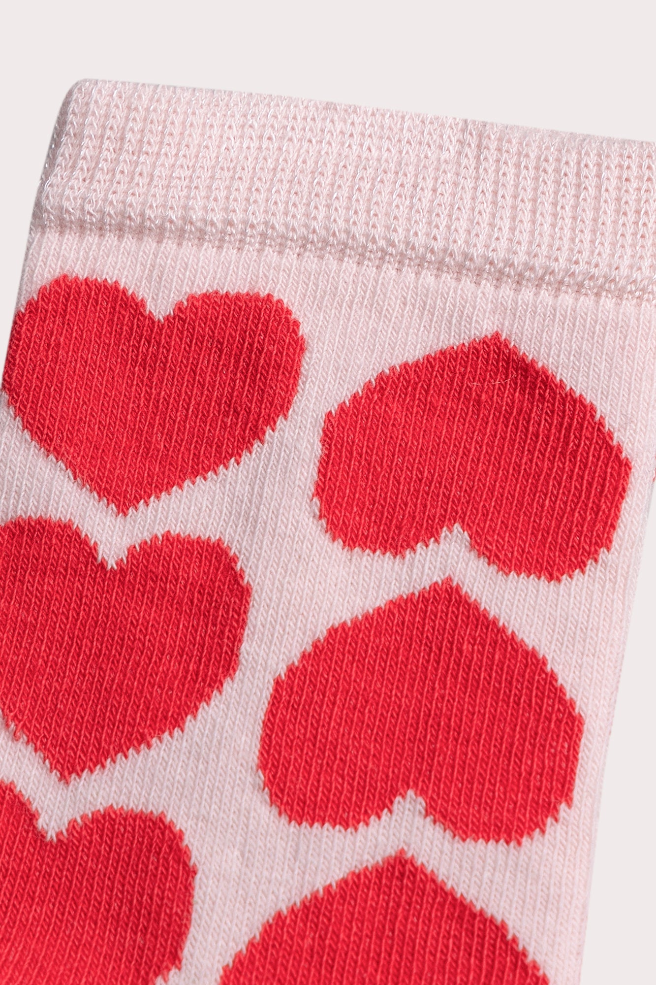 Chaussettes roses à cœurs rouges pour fille
