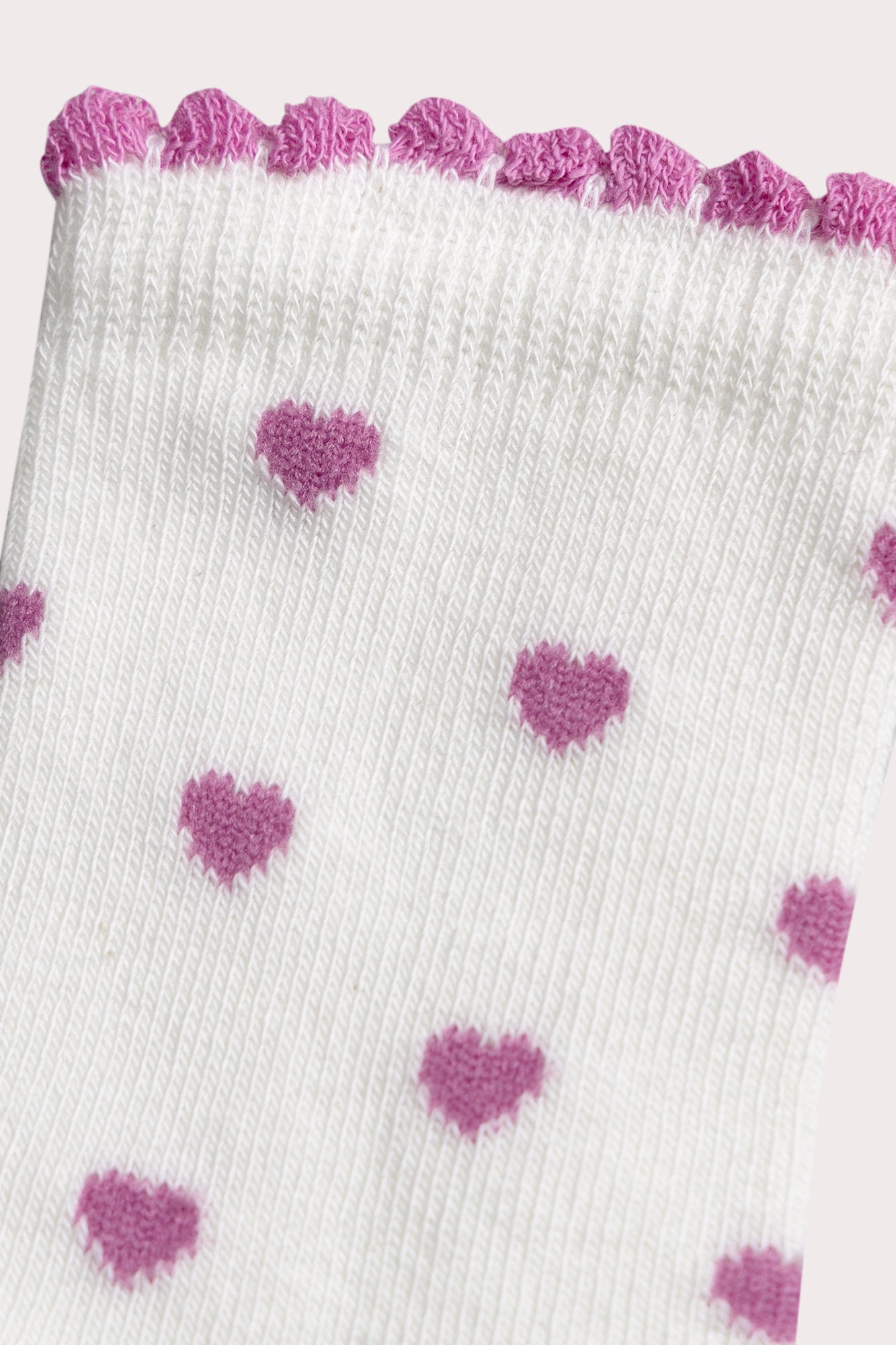 Chaussettes roses à cœurs pour bébé fille